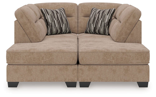 Mocha sectional sofa with two chaise ends, tufted seat cushions and two patterned throw pillows