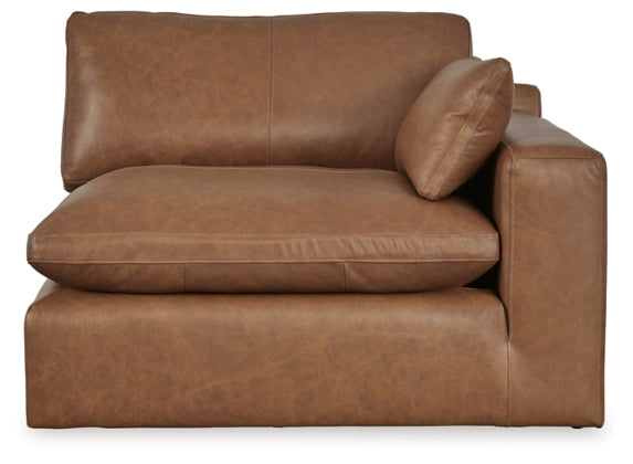 Caramel sectional sofa chaise with large back cushion and two bolster pillows
