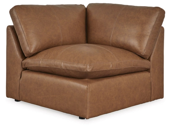 Caramel sectional sofa chaise with curved armrests and deep seat cushion