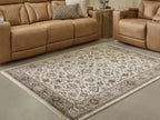 Beritham rug laid in living room with vintage floral motifs, beige and muted multicolor design