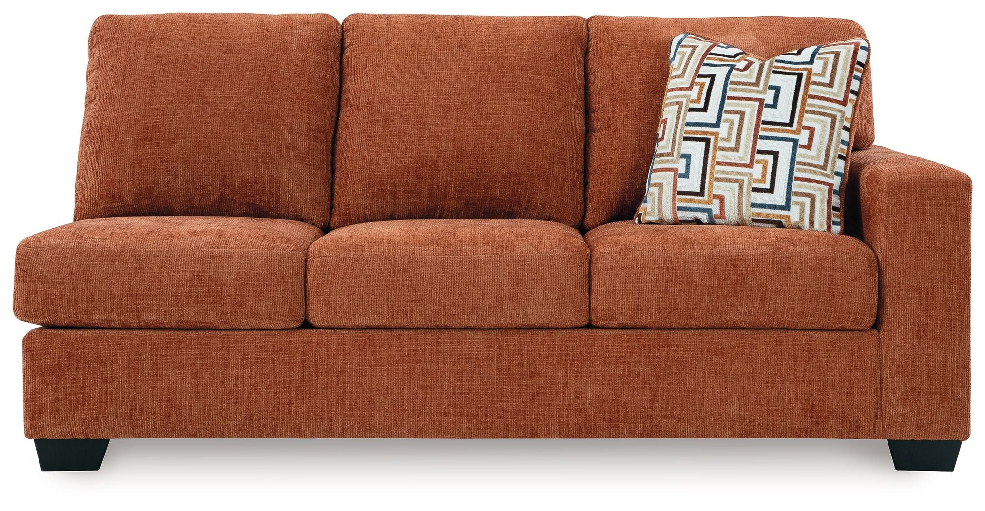 Rust orange RAF sofa with straight armrests and patterned throw pillow