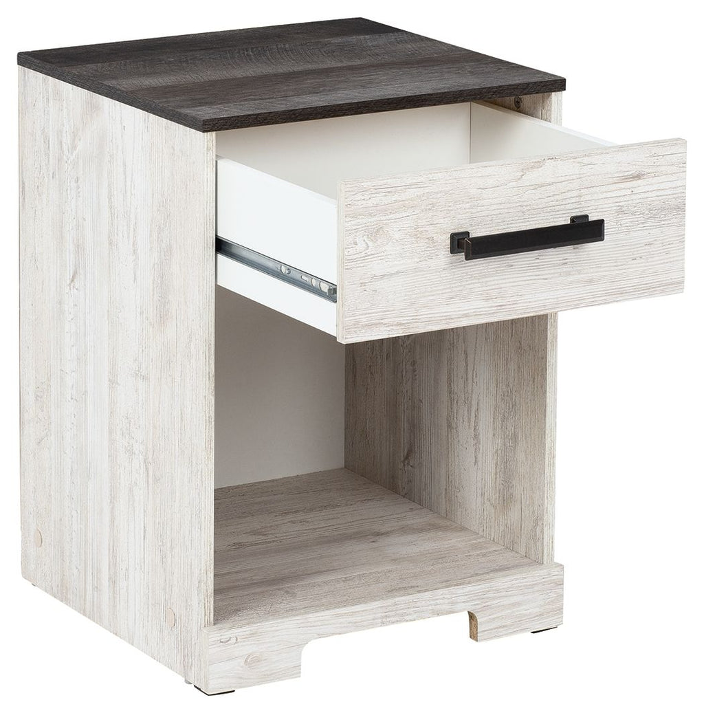 Night stand with open cubby and drawer pulled out, dark bar handle, whitewash finish