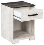Night stand with open cubby and drawer pulled out, dark bar handle, whitewash finish