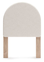 Upholstered panel headboard with arched white fabric and two wooden legs