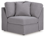 Gray fabric wedge sectional armchair with two back cushions and square arms