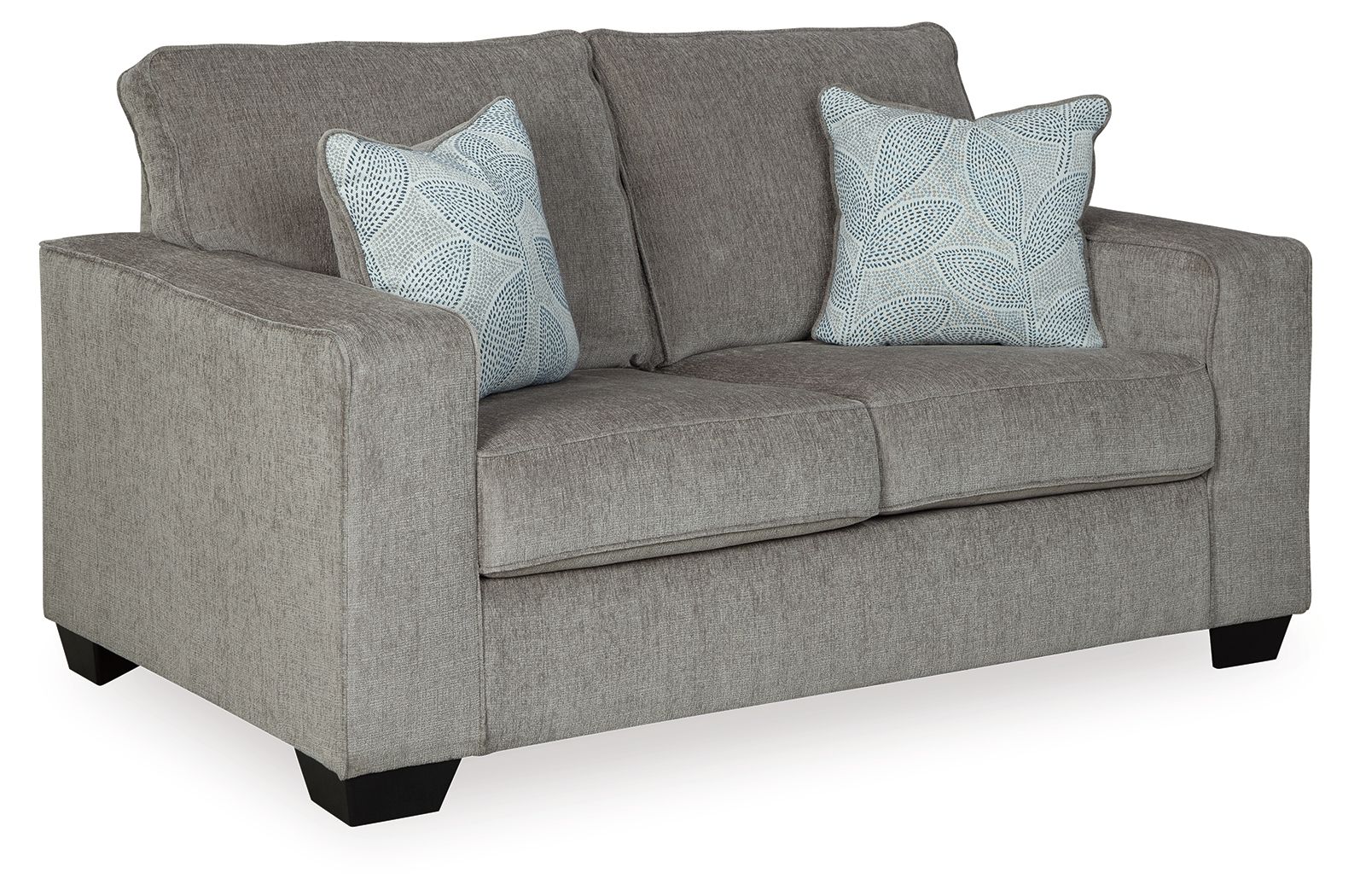 Light gray loveseat with two light blue patterned throw pillows and wide track arms