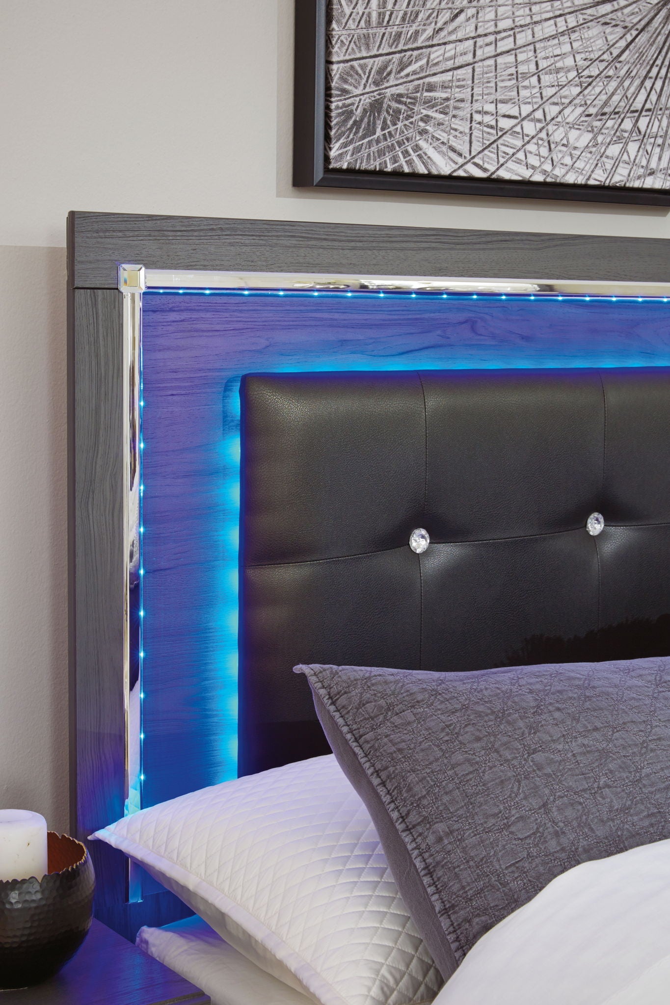 Gray upholstered panel headboard with blue LED light strip along the side