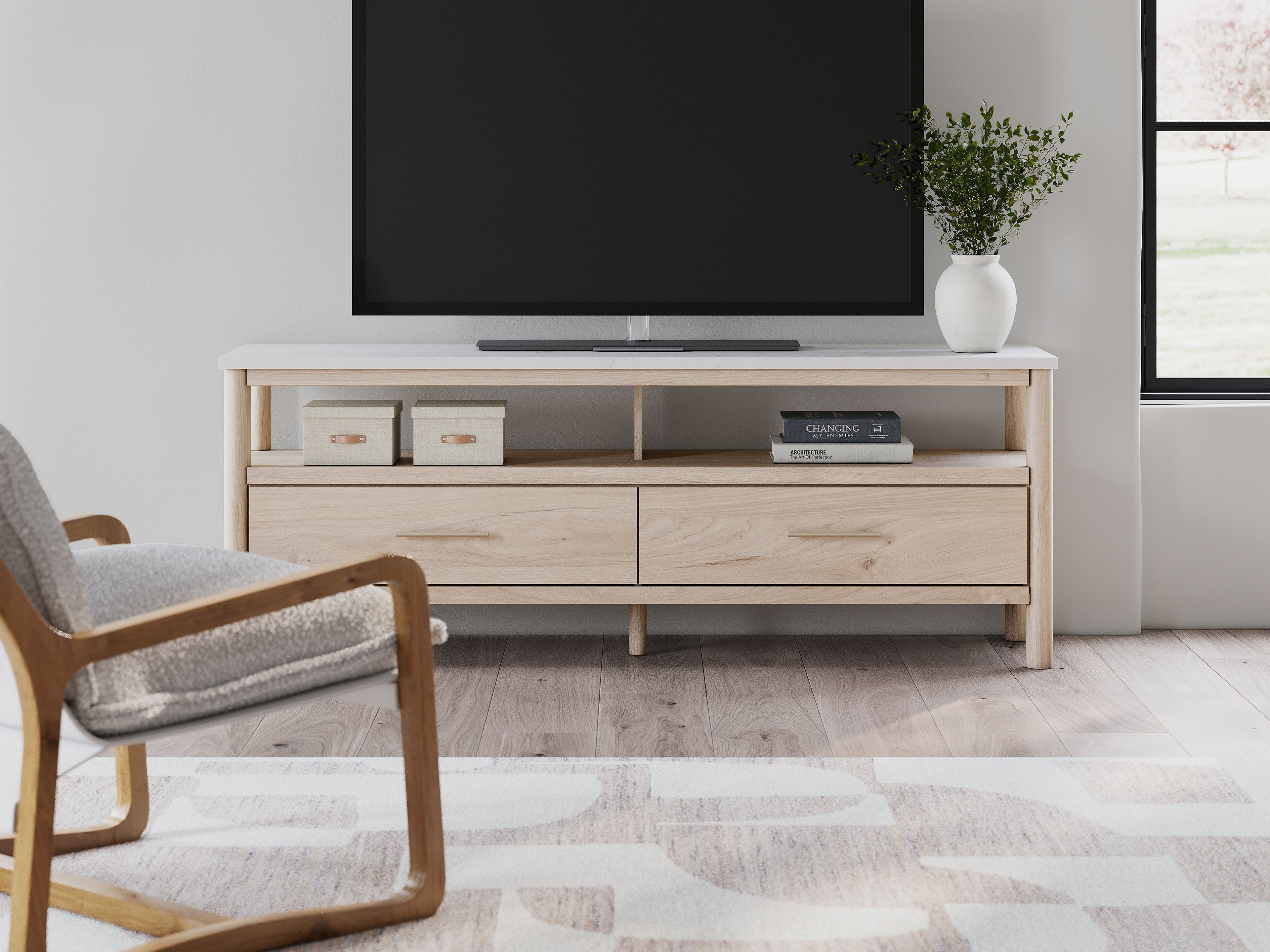 Light wood TV stand with two drawers and open shelves for media