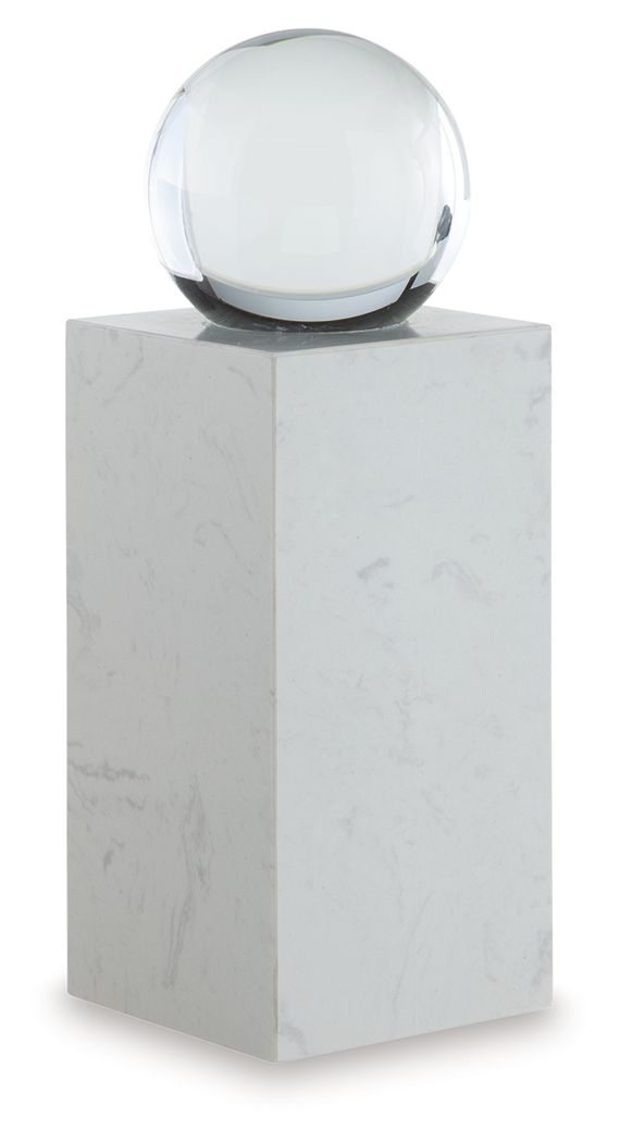 White glass sphere on white marble pedestal, front view