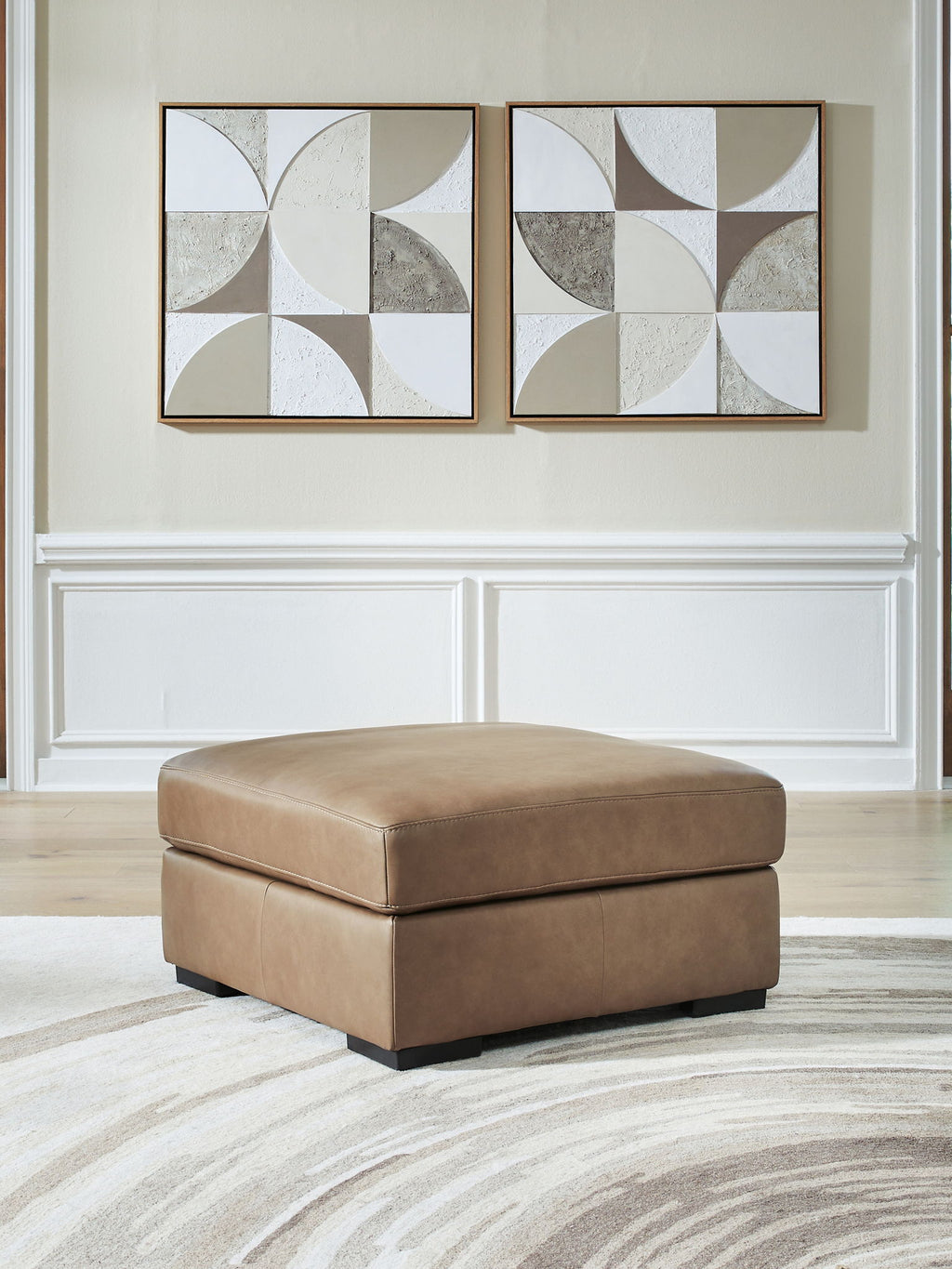 Oversized accent ottoman in taupe faux leather, square top, black base