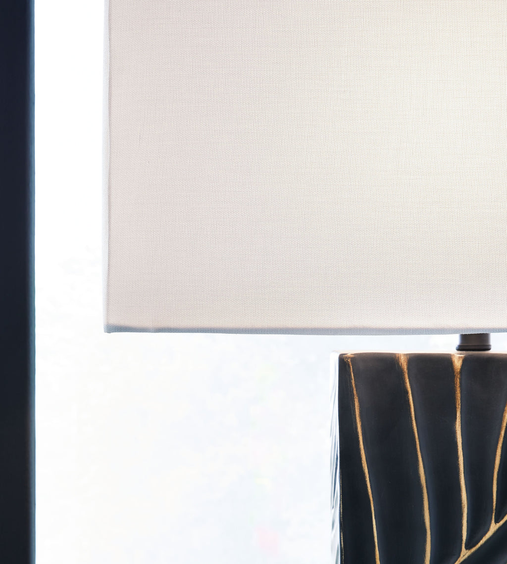Table lamp shade edge and black base with gold line pattern