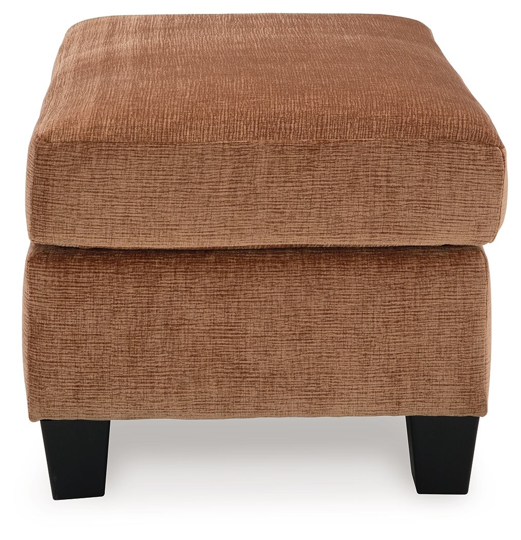 Clay upholstered ottoman with rounded rectangular top, textured fabric, dark tapered legs