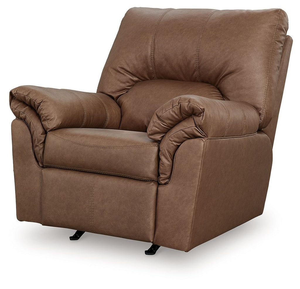 Caramel-brown upholstered rocker recliner with padded arms, tufted back, and recline seat