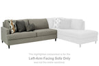 Dark gray L-shaped sectional sofa with chaise and two throw pillows