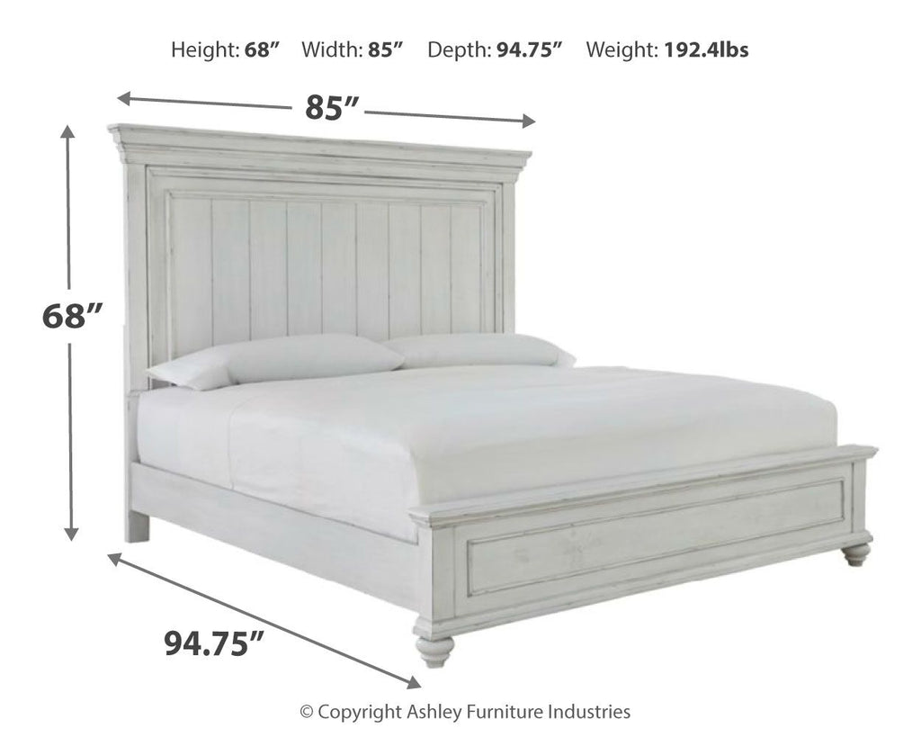 White panel bed with tall headboard and low footboard, featuring vertical panel detailing.