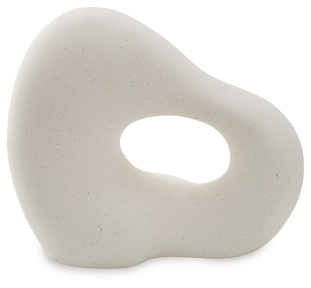 Off-white abstract sculpture with oval cutout, smooth pebble-like texture