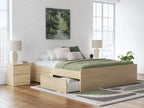 Platform bed with light brown wood frame and front storage drawer