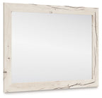 Rectangular bedroom mirror with whitewashed light wood frame