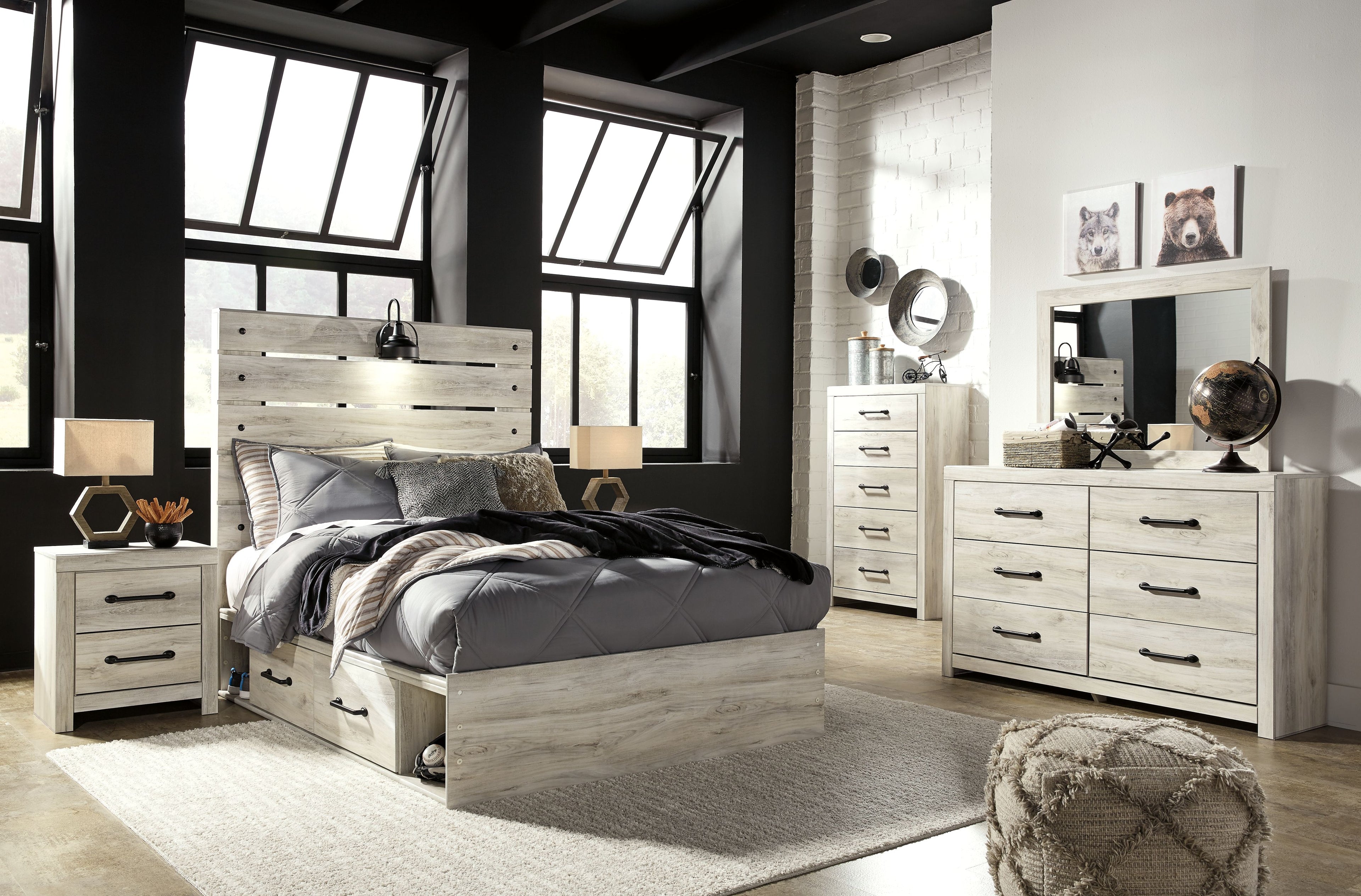 Youth bedroom set with light wood bed frame, two nightstands, and dresser with mirror