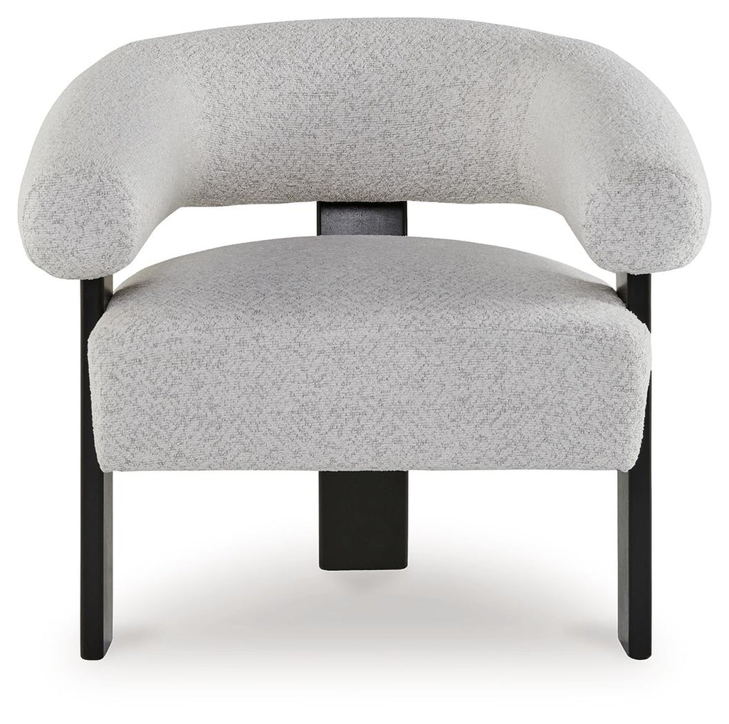 Upholstered light gray accent chair with wide arms and dark square legs