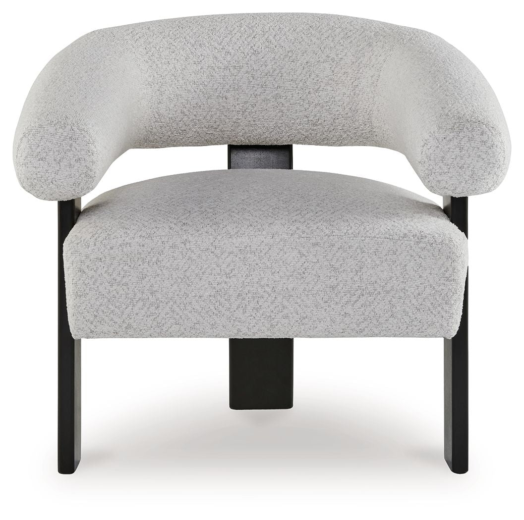 Upholstered light gray accent chair with wide arms and dark square legs