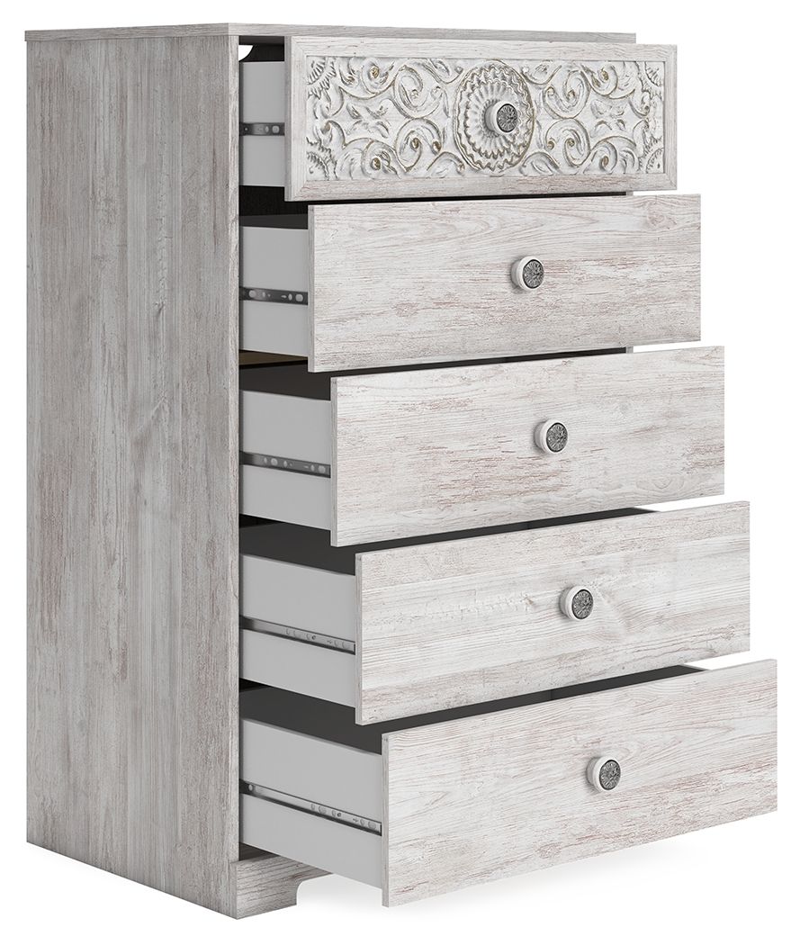 Whitewash chest of drawers with ornate top, side view showing open drawers and knobs