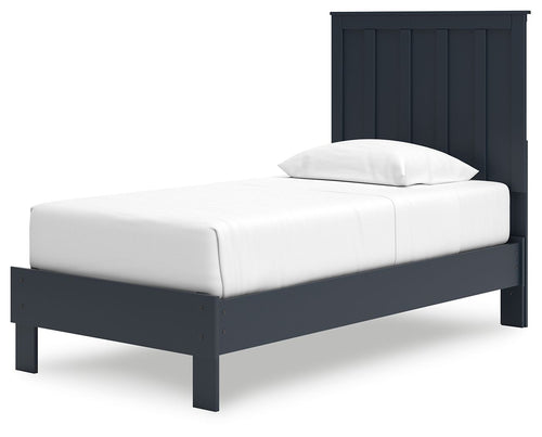Blue platform bed with panel headboard, white mattress and rounded side rails