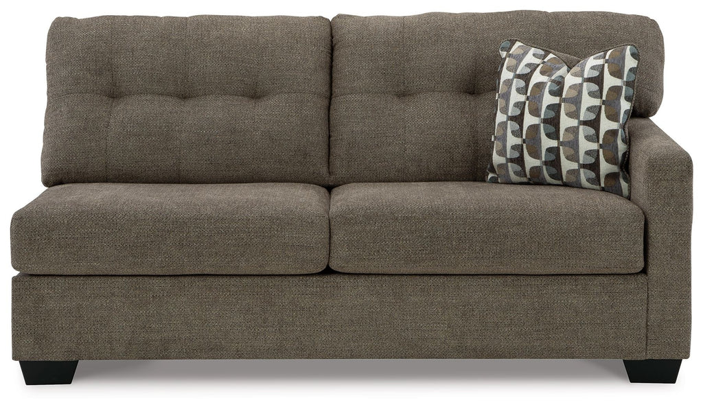 Tufted two-seat sofa with dark brown fabric, squared arms, and patterned accent pillows
