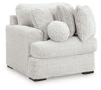 Corner armchair with rounded arm and arctic light-gray textured fabric, back cushions and bolster