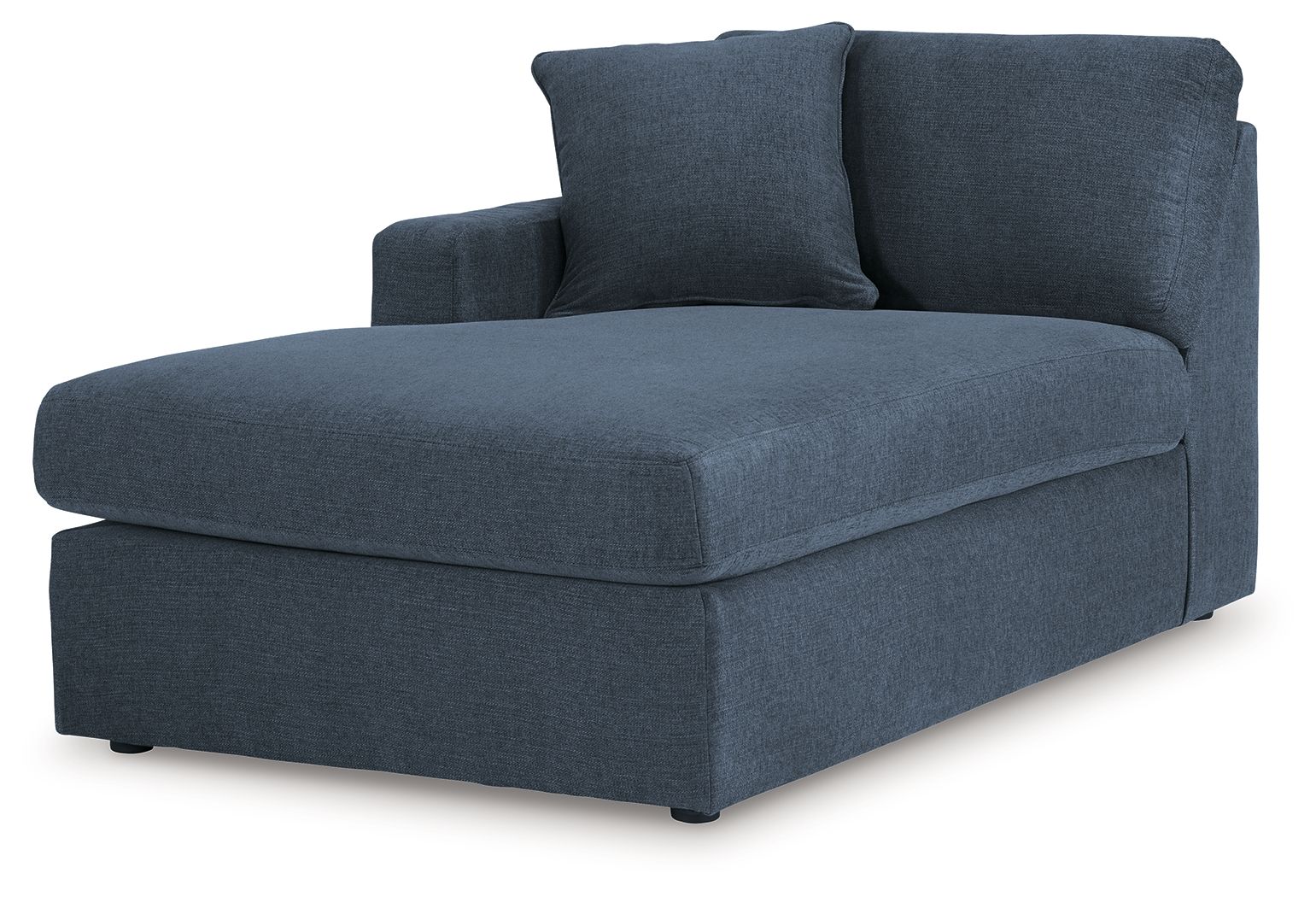 Ink blue corner chaise with thick seat, armrest, and two back pillows