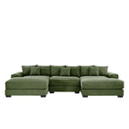 Green corduroy sectional sofa with three back cushions and two chaise-style ottomans
