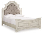 Upholstered panel bed with tufted beige headboard and white frame, two pillows