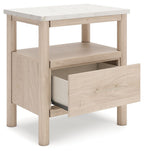 Beige one-drawer night stand with open drawer revealing interior shelf