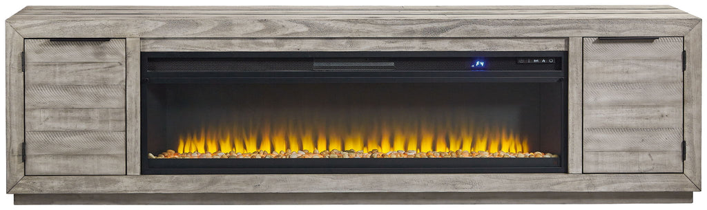 Gray TV stand with wide fireplace insert and two side cabinet doors, flat top