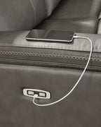 Power reclining sectional sofa console with cup holder and power control button with cable