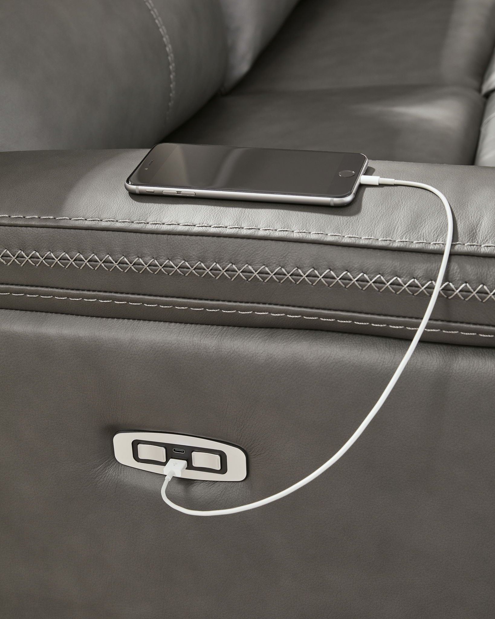 Power reclining sectional sofa console with cup holder and power control button with cable