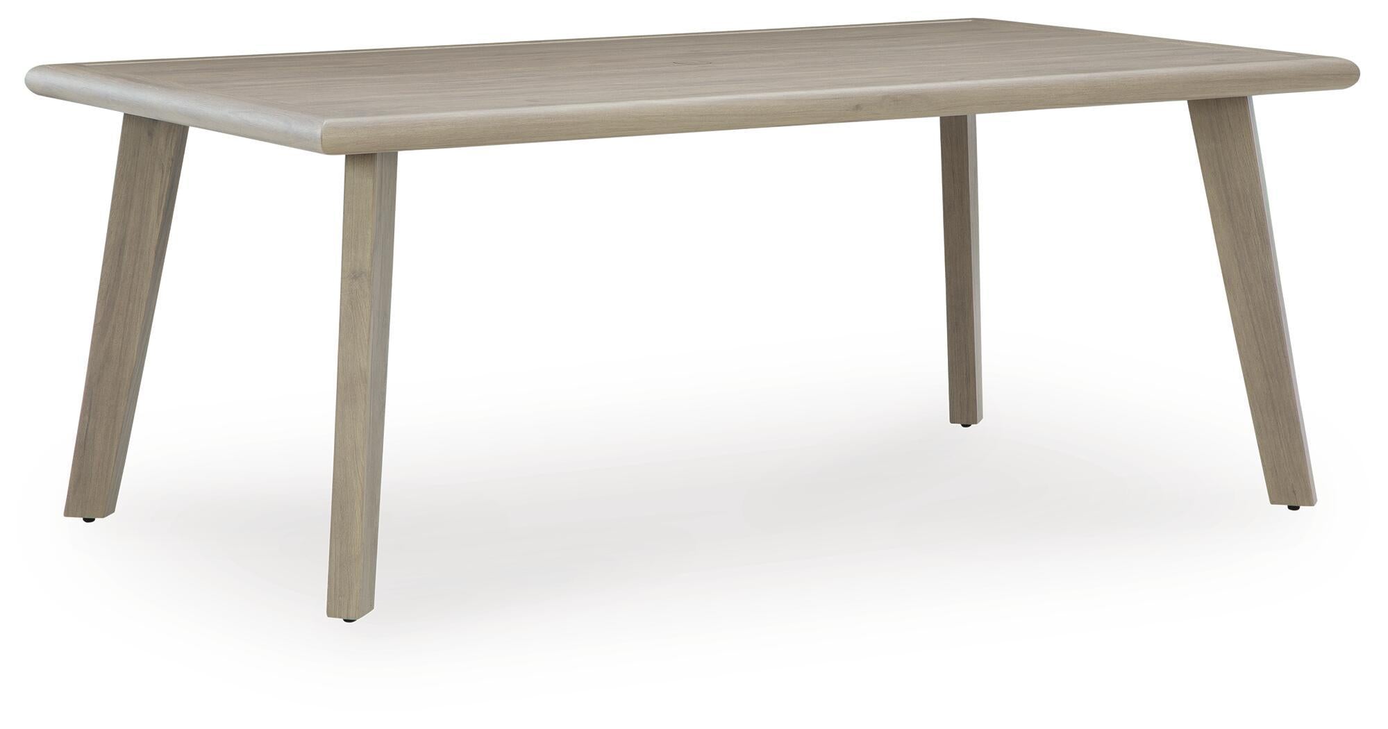 Beige rectangle dining table with smooth tabletop and tapered legs