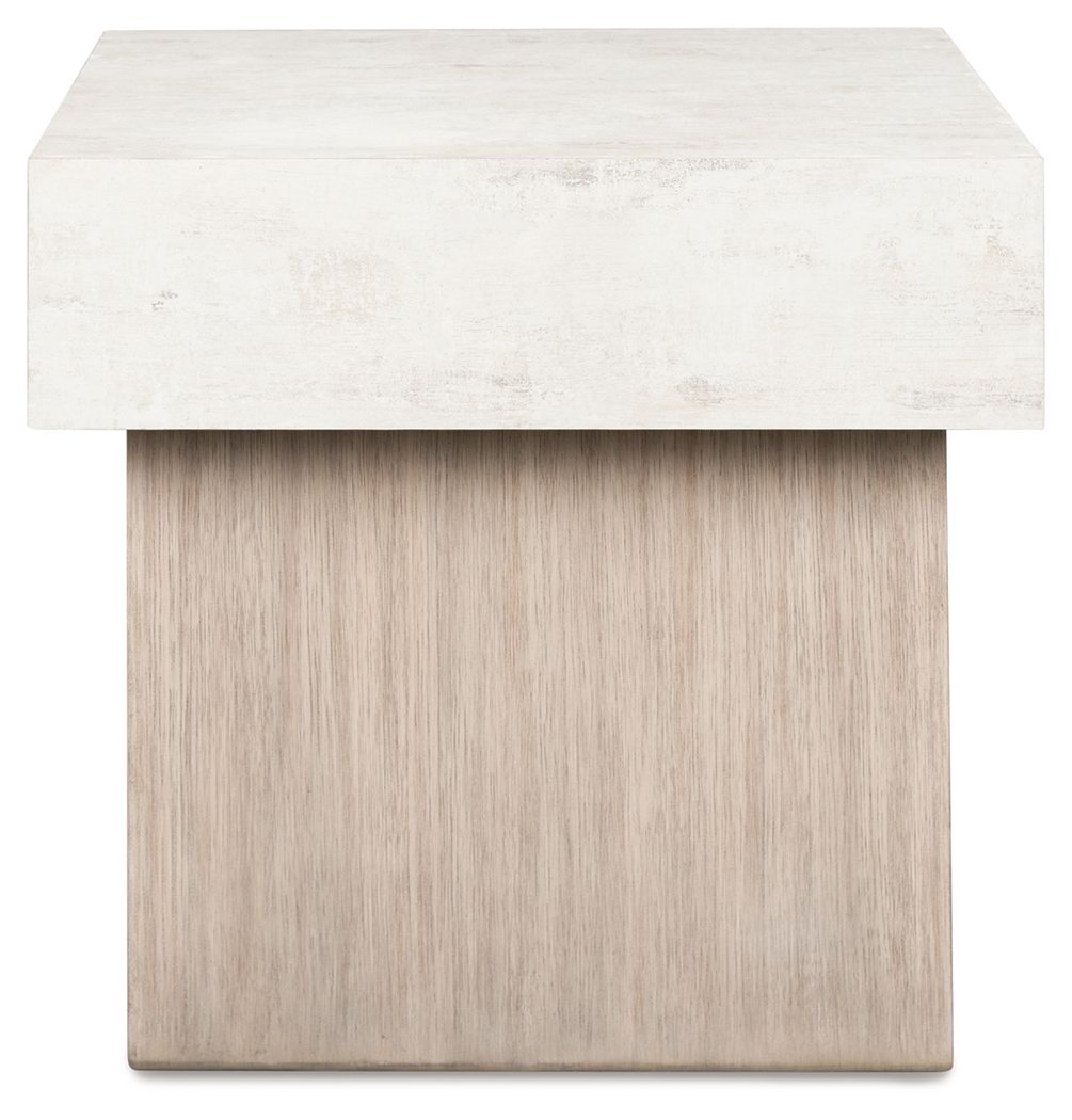 Jorlaina rectangular table with whitewashed top and front-facing light wood leg panel