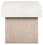 Jorlaina rectangular table with whitewashed top and front-facing light wood leg panel