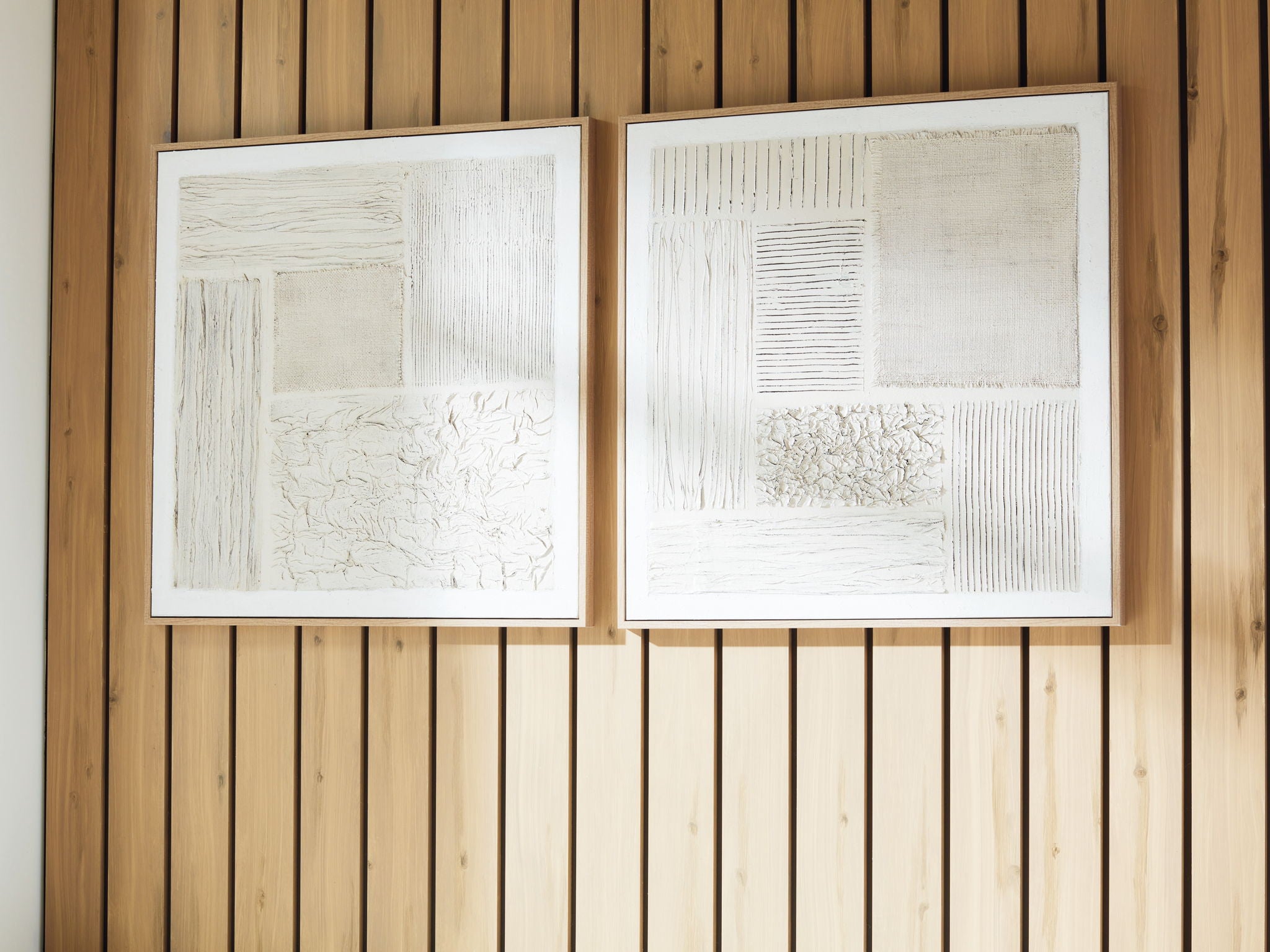 Set of 2 framed abstract wall prints with textured white squares and lines; beige frames