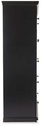 Black five-drawer chest with top pull handles and recessed drawer fronts