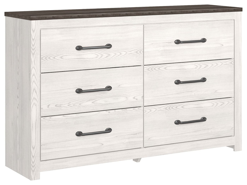 White wood dresser with four drawers and black bar pulls, dark wood top