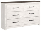 White wood dresser with four drawers and black bar pulls, dark wood top