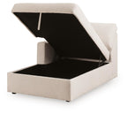 Corner chaise with storage, open lift-top showing dark interior, light oyster upholstery