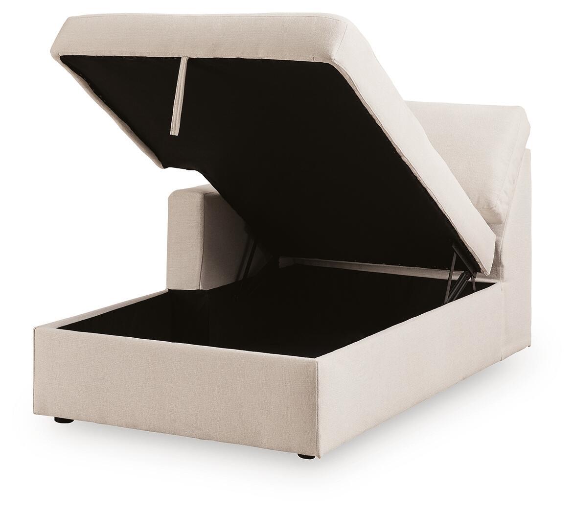 Corner chaise with storage, open lift-top showing dark interior, light oyster upholstery