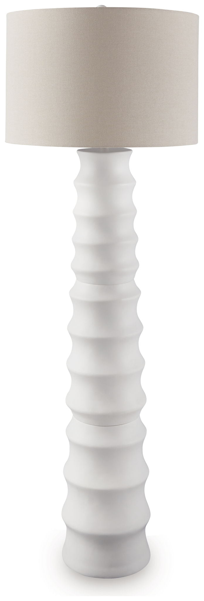 White table lamp with fabric drum shade and tall ridged pedestal base
