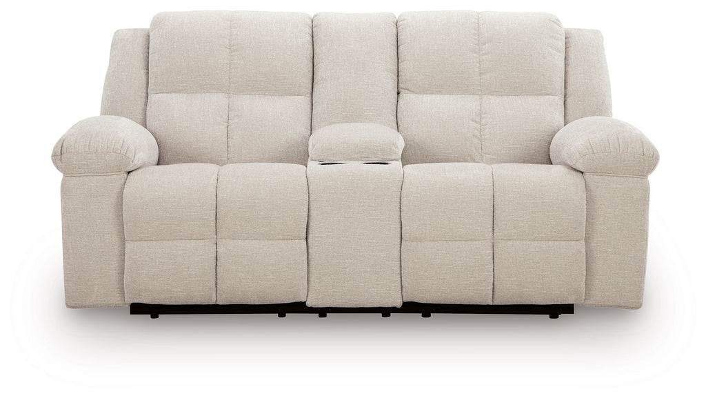 Double reclining loveseat with console, light beige upholstery, padded back and armrests