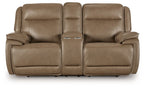 Power reclining loveseat with center console, brown upholstery, padded armrests and seats