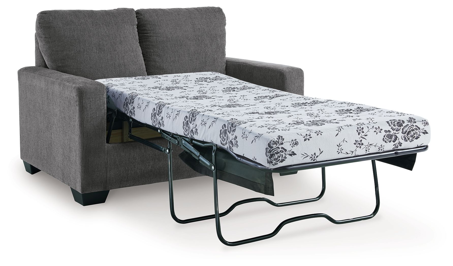 Dark gray sofa bed with pulled-out mattress and floral patterned cover