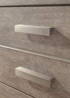 Gray night stand drawer with long bar pull and subtle woodgrain texture